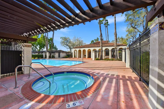 a view of a street with houses on the road