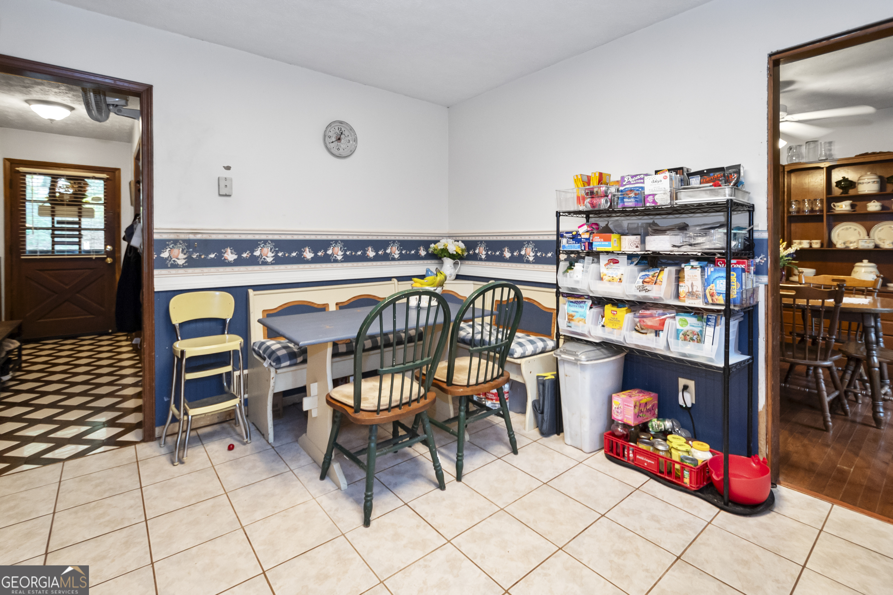 1972 Cox Drive Austell, GA 30168 - Photo 14 of 40 a dining room with furniture and a book shelf