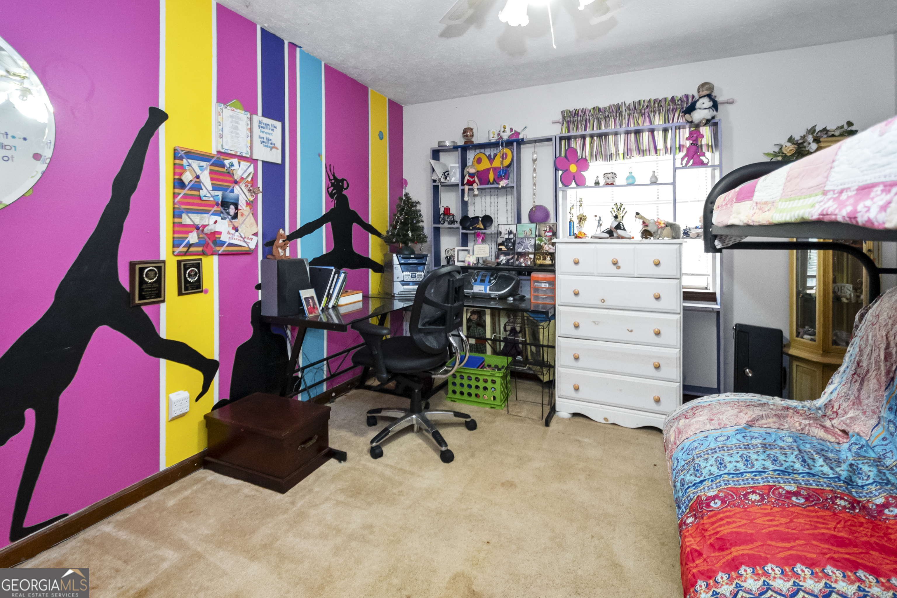 1972 Cox Drive Austell, GA 30168 - Photo 19 of 40 a view of walk in closet with clothes and shoes