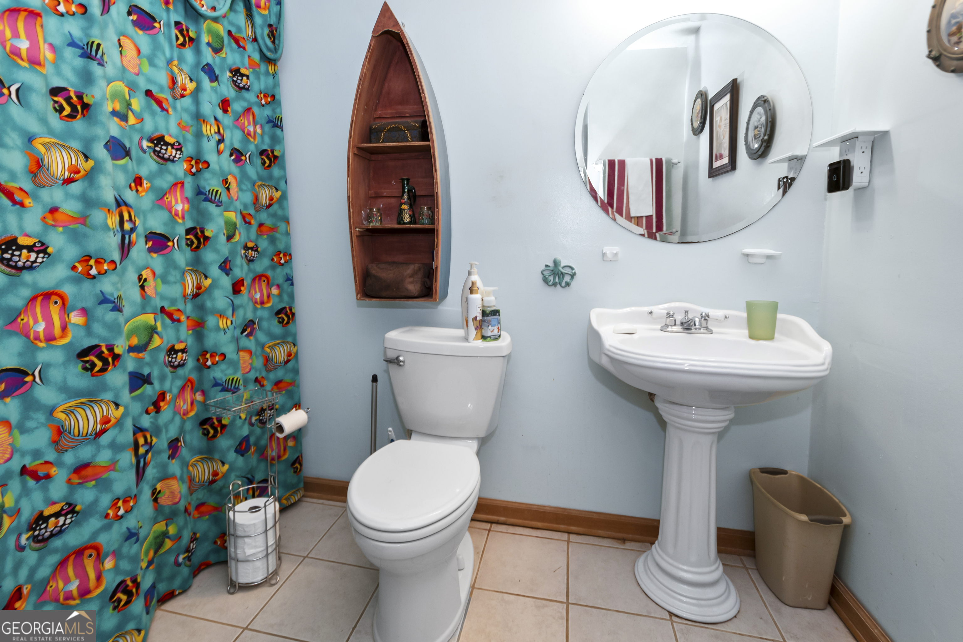 1972 Cox Drive Austell, GA 30168 - Photo 23 of 40 a bathroom with a sink toilet and a mirror