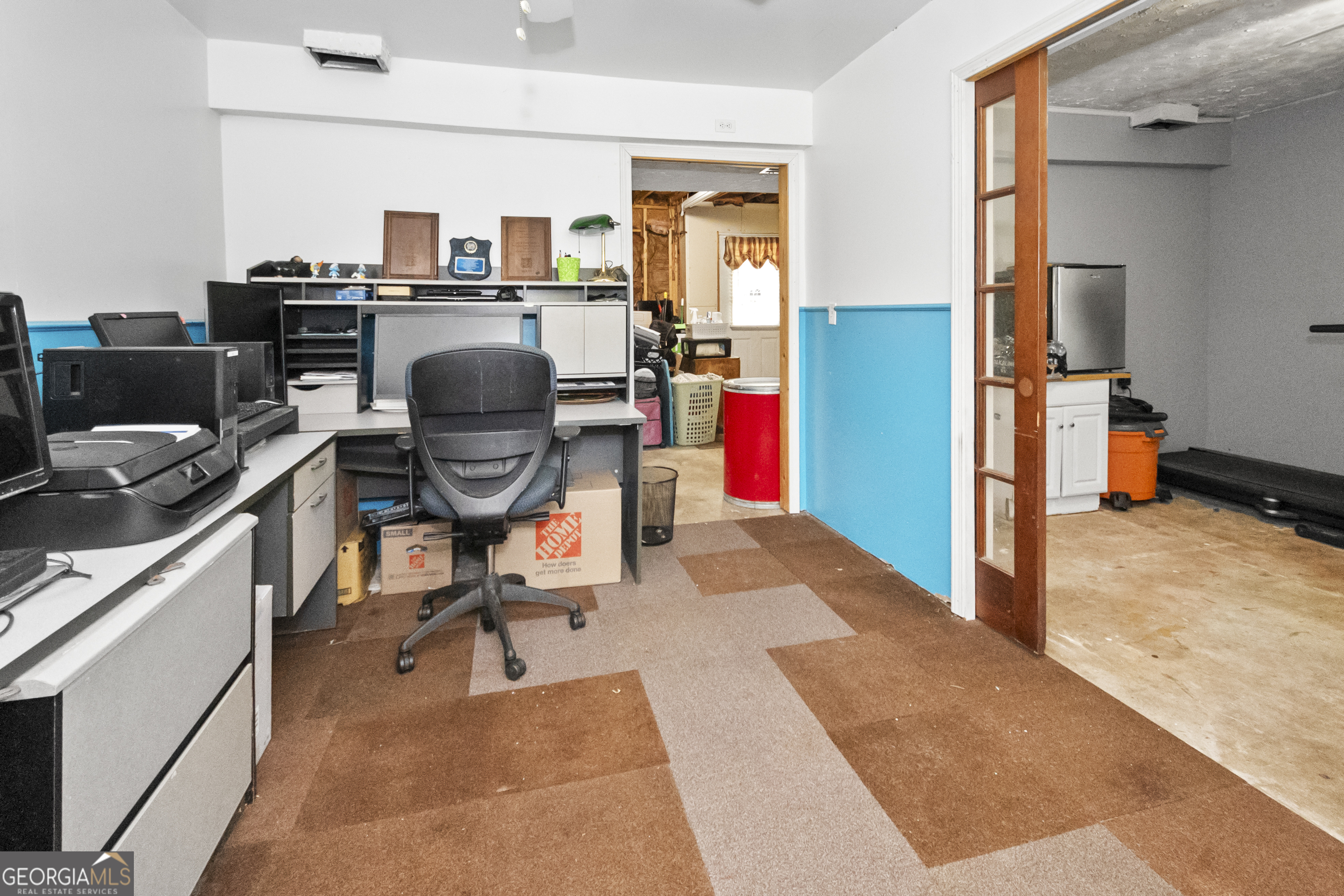 1972 Cox Drive Austell, GA 30168 - Photo 28 of 40 a view of a workspace with furniture and a window