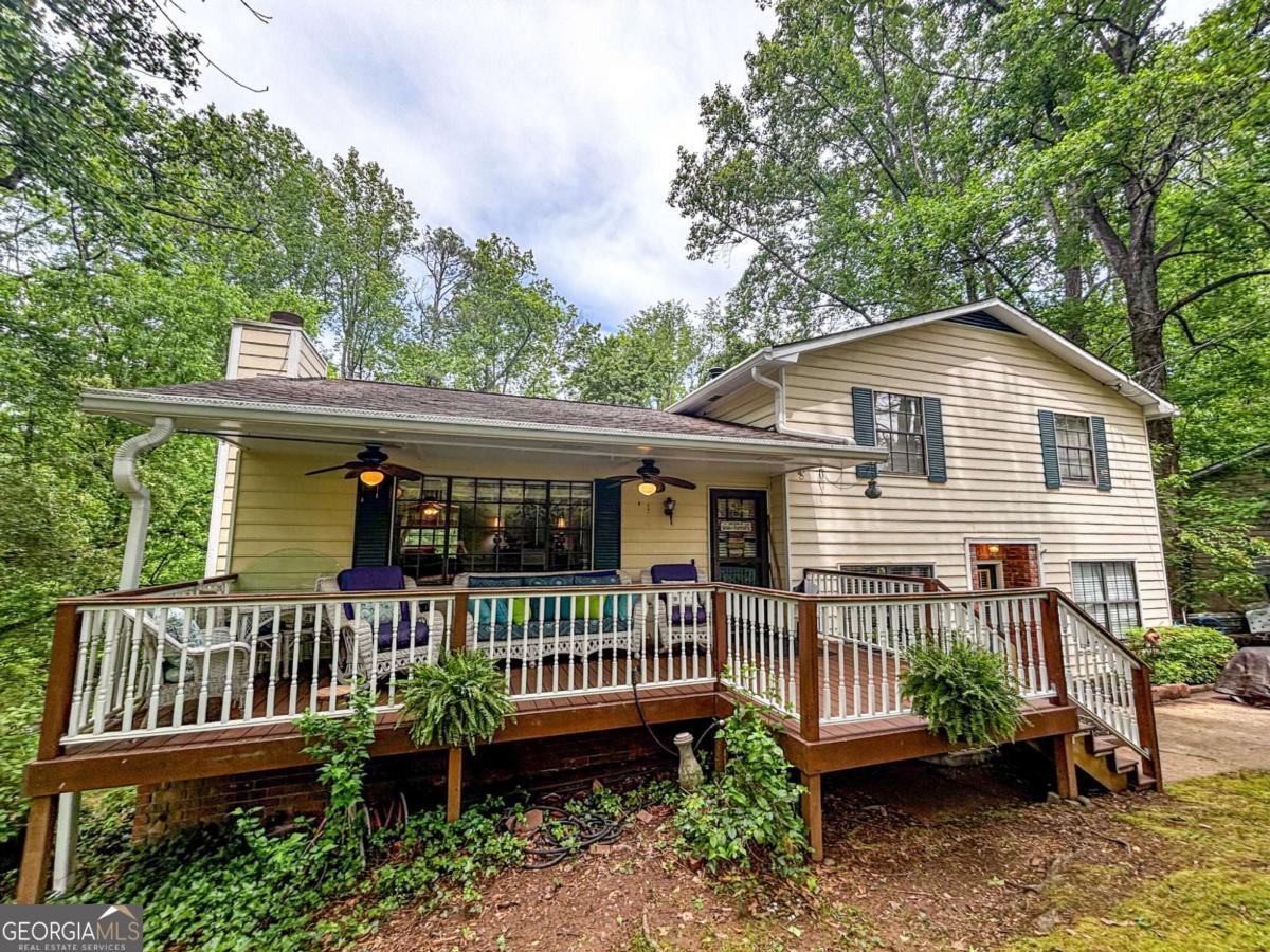 1972 Cox Drive Austell, GA 30168 - Photo 3 of 40 a view of a house with a roof deck and furniture