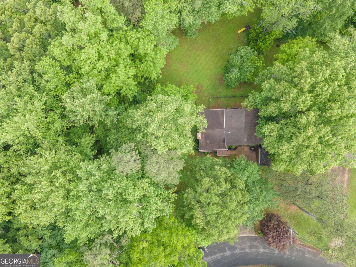 1972 Cox Drive Austell, GA 30168 - Photo 36 of 40 an aerial view of a house with a yard and lake view