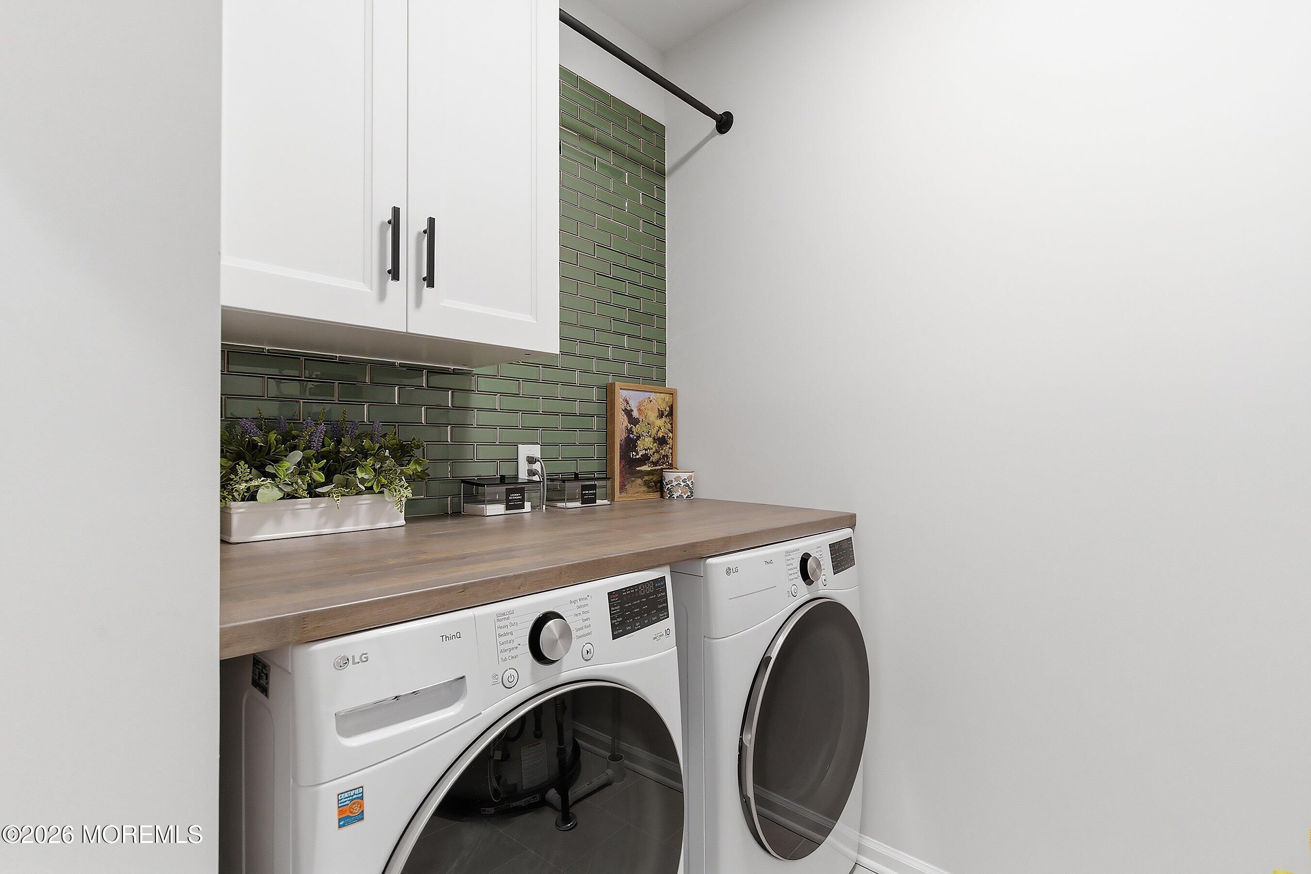 5 Laird Way Neptune, NJ 07753 - Photo 23 of 35 a utility room with dryer and washer