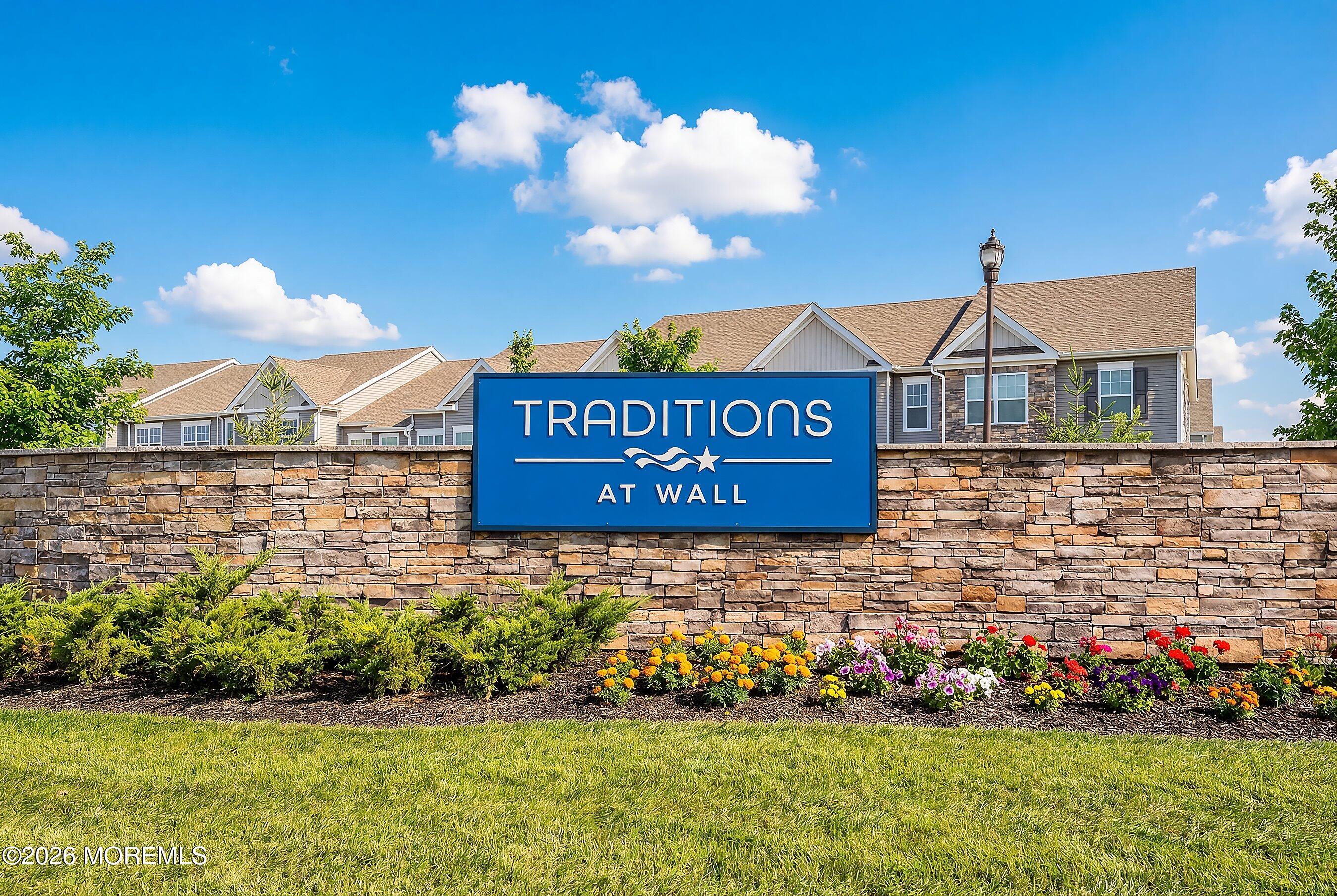 5 Laird Way Neptune, NJ 07753 - Photo 27 of 35 a sign that is sitting in front of a brick house