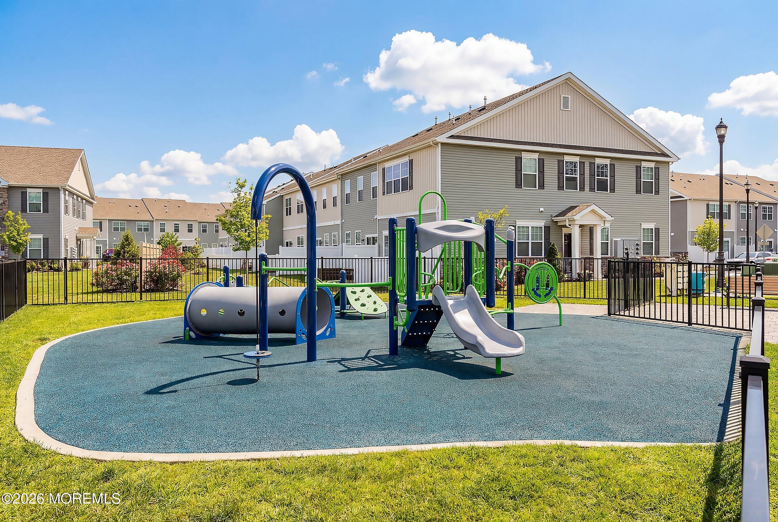 5 Laird Way Neptune, NJ 07753 - Photo 28 of 35 a view of a house with a swimming pool