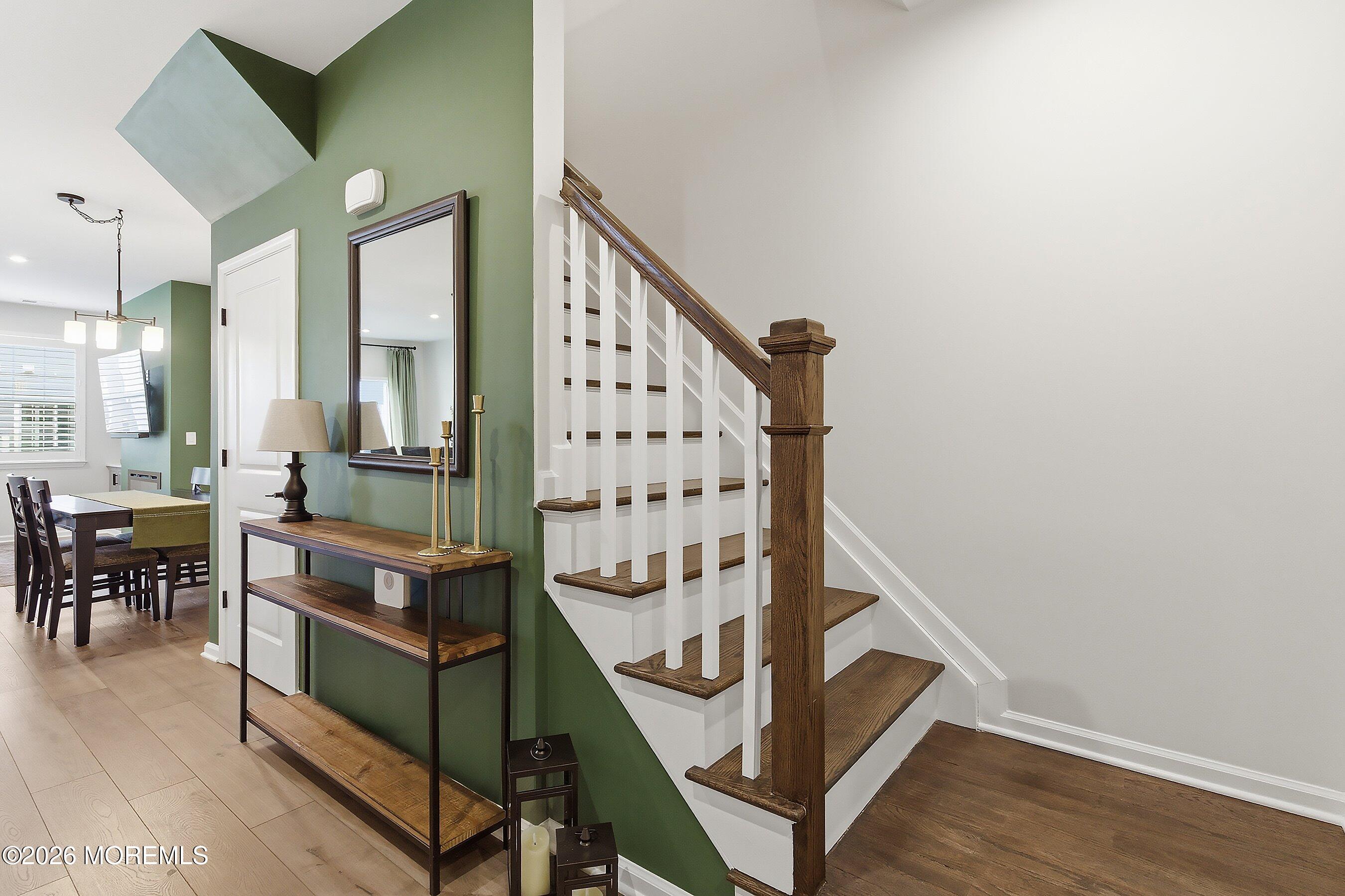 5 Laird Way Neptune, NJ 07753 - Photo 3 of 35 a view of entryway dining room and hall with wooden floor