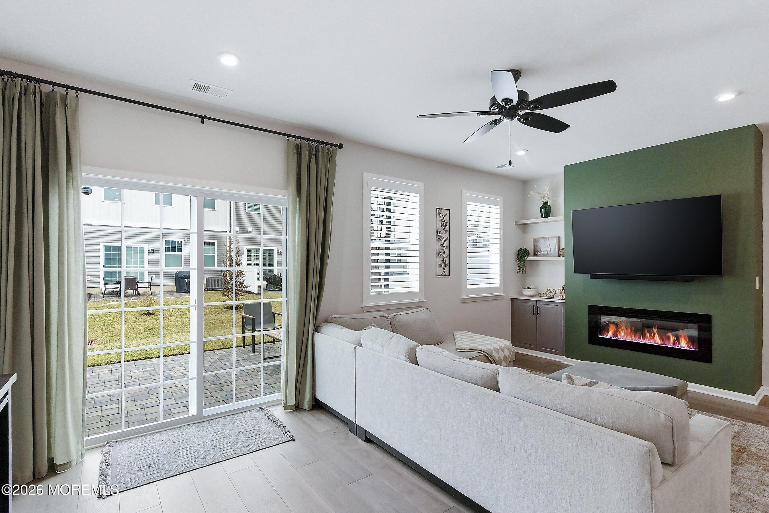 5 Laird Way Neptune, NJ 07753 - Photo 10 of 35 a living room with furniture and a flat screen tv