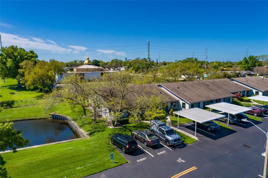 1601 43rd Street, Unit 149 St. Petersburg, FL 33713 - Photo 21 of 51 a view of a houses with a yard