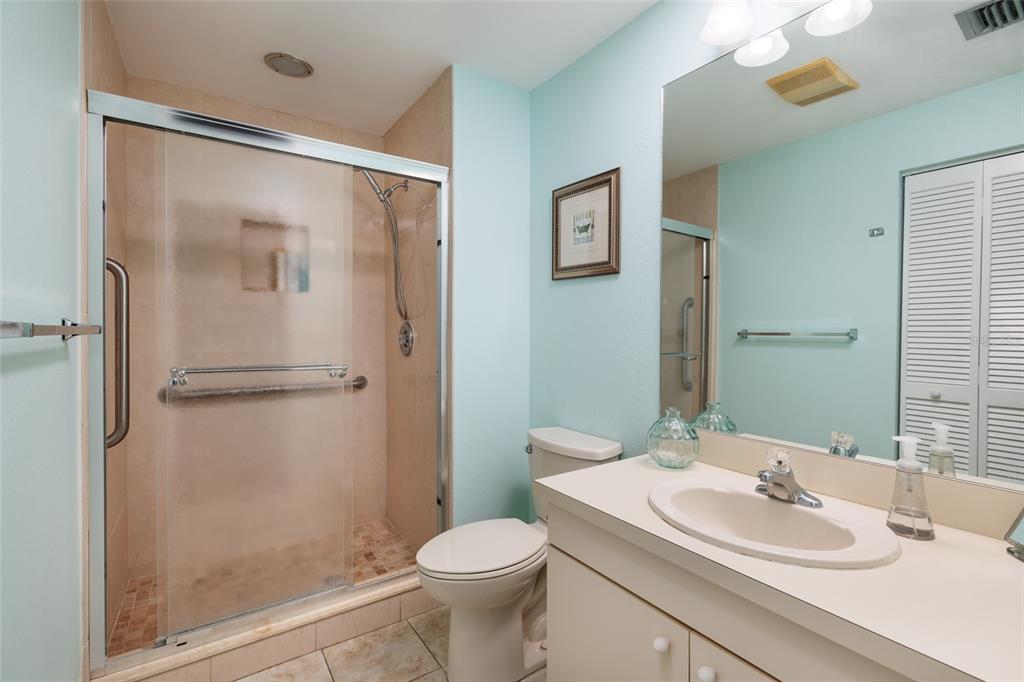 1601 43rd Street, Unit 149 St. Petersburg, FL 33713 - Photo 24 of 51 a bathroom with a sink toilet and shower