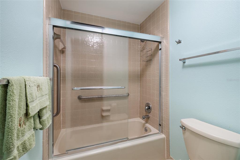 1601 43rd Street, Unit 149 St. Petersburg, FL 33713 - Photo 25 of 51 a bathroom with a bathtub and a shower