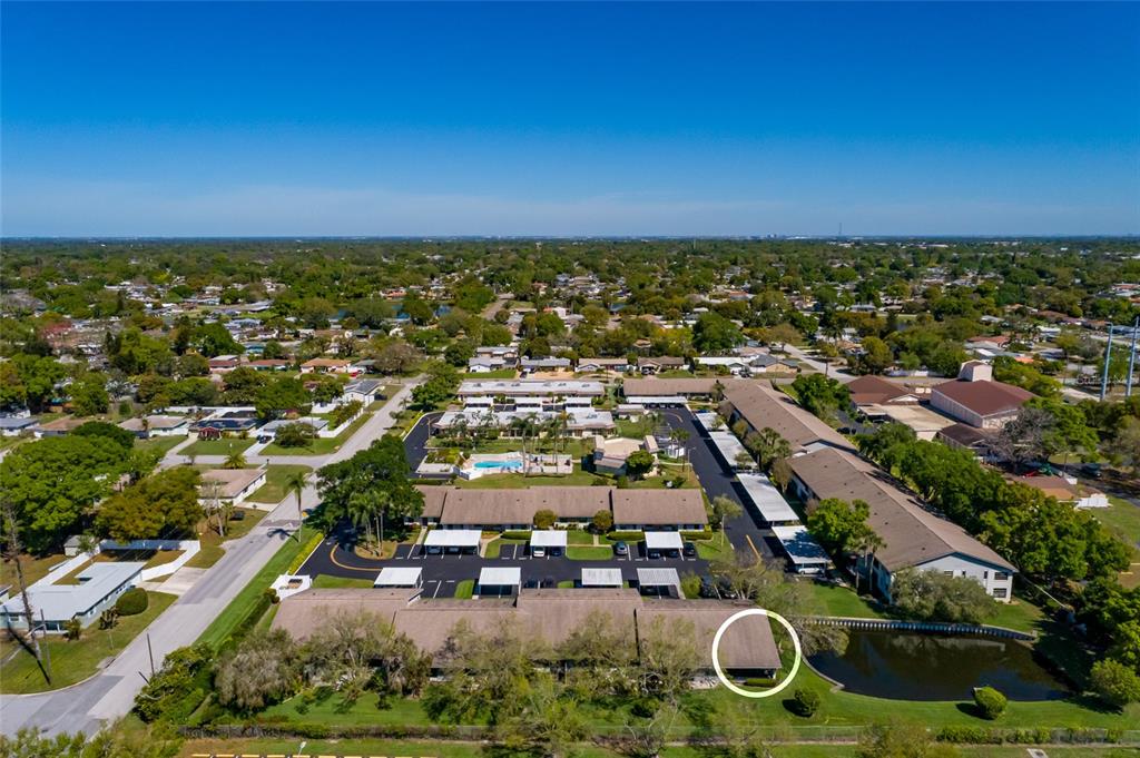 1601 43rd Street, Unit 149 St. Petersburg, FL 33713 - Photo 31 of 51 an aerial view of residential houses with outdoor space