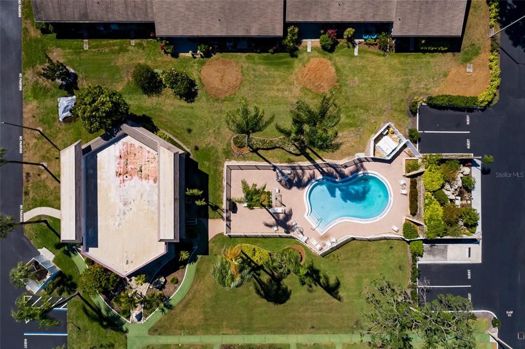 1601 43rd Street, Unit 149 St. Petersburg, FL 33713 - Photo 33 of 51 an aerial view of a house a yard and outdoor seating