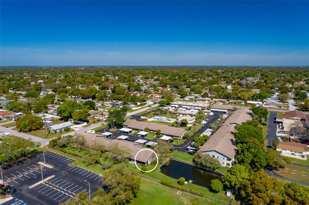 1601 43rd Street, Unit 149 St. Petersburg, FL 33713 - Photo 34 of 51 an aerial view of residential houses with outdoor space