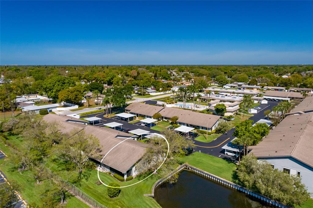 1601 43rd Street, Unit 149 St. Petersburg, FL 33713 - Photo 45 of 51 an aerial view of residential houses with outdoor space