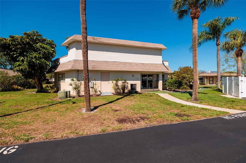 1601 43rd Street, Unit 149 St. Petersburg, FL 33713 - Photo 47 of 51 a view of house with outdoor space and garden