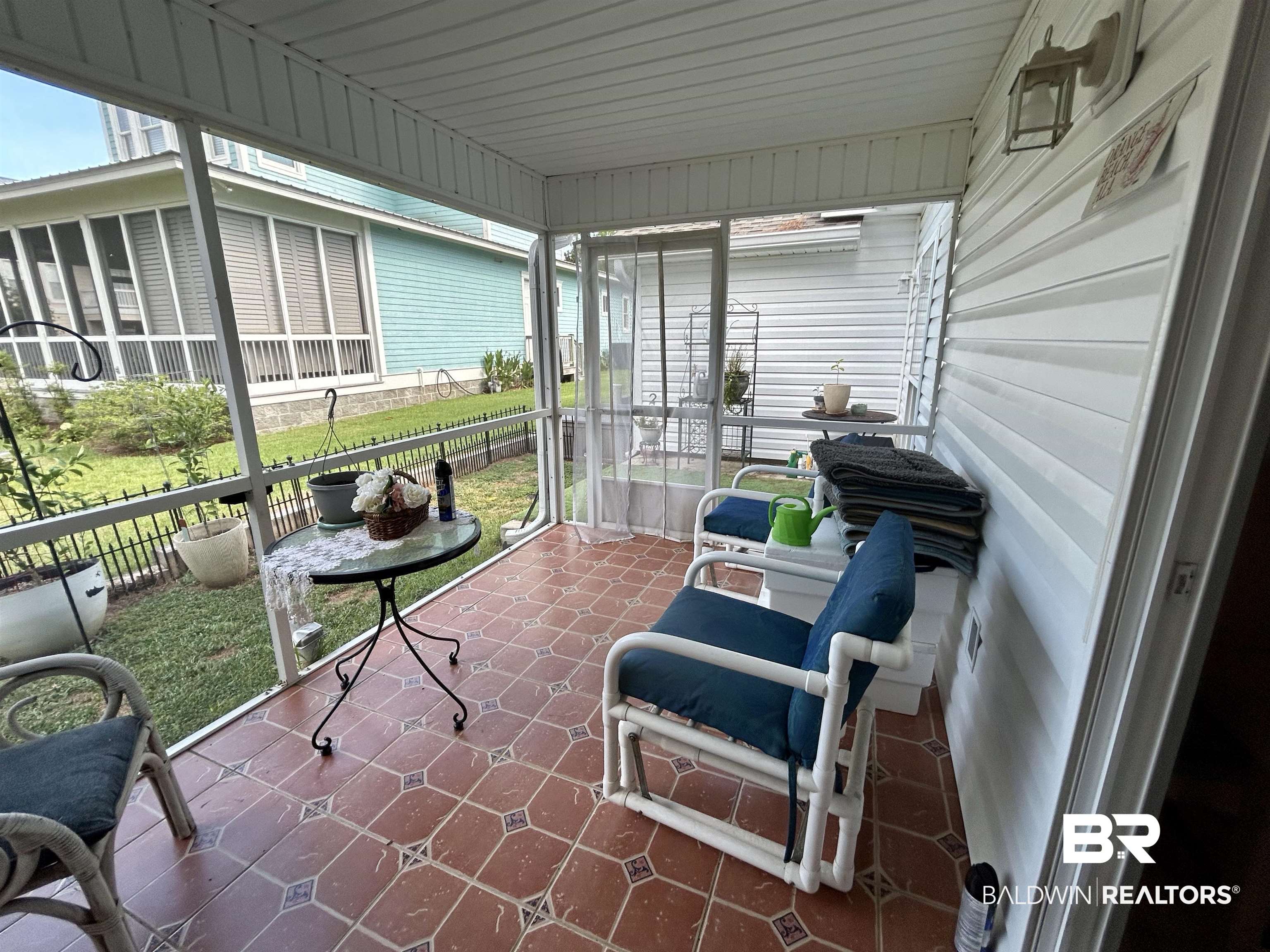 26063 Canal Road, Unit 2D Orange Beach, AL 36561 - Photo 41 of 48 Screened Back Porch