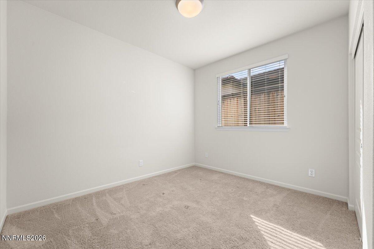 9225 Sassafras Trail Reno, NV 89523 - Photo 26 of 65 an empty room with a window