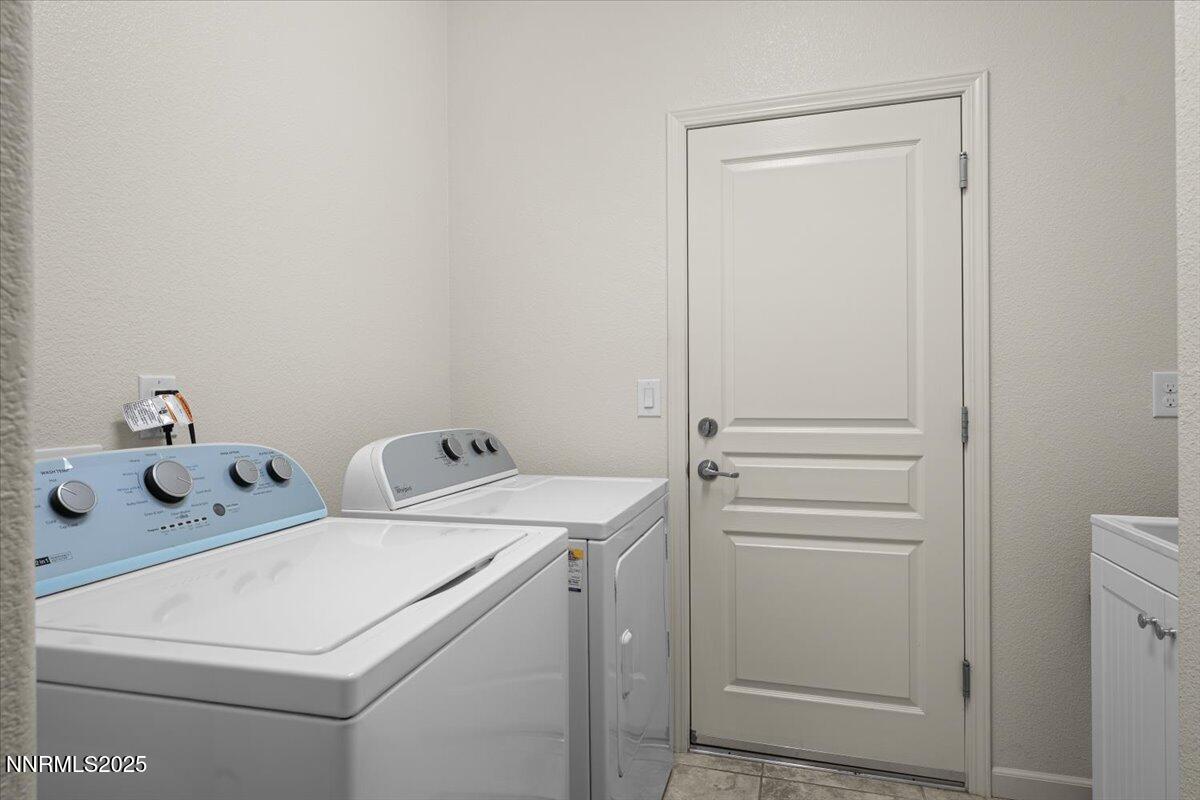 9225 Sassafras Trail Reno, NV 89523 - Photo 51 of 65 a utility room with dryer and washer