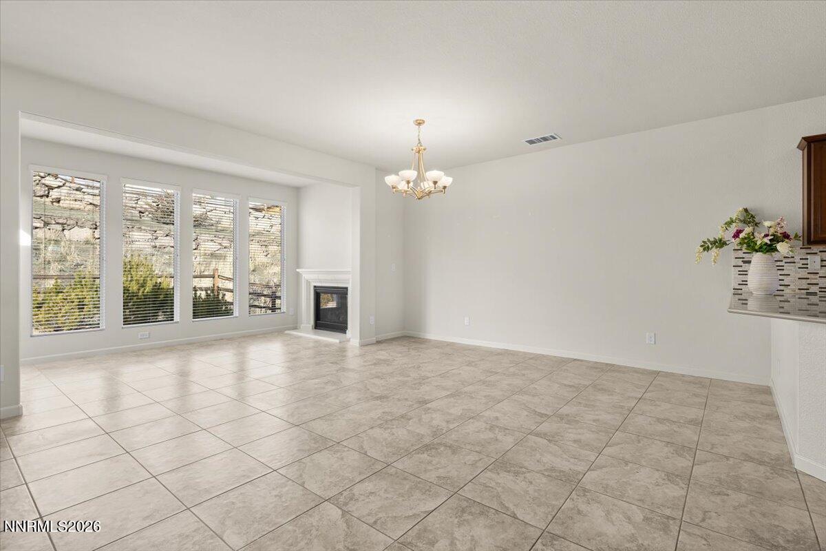 9225 Sassafras Trail Reno, NV 89523 - Photo 7 of 65 a view of an empty room with a window