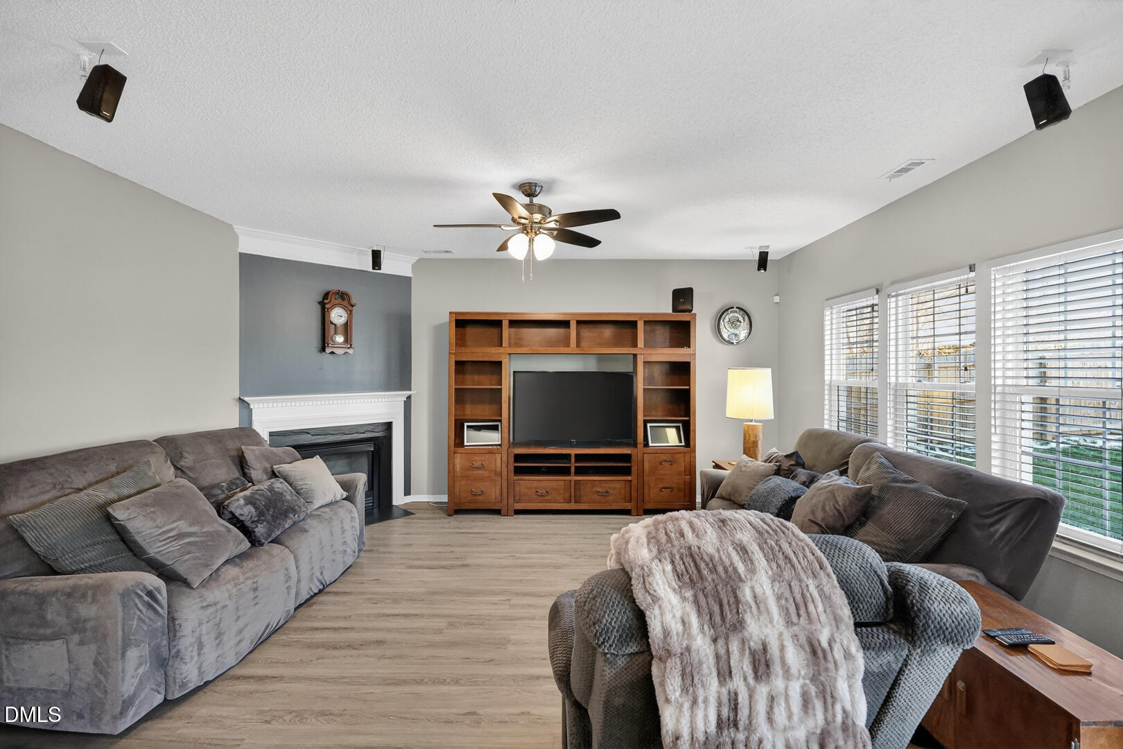5709 Apalachicula Drive Raleigh, NC 27616 - Photo 12 of 47 a living room with furniture and a flat screen tv