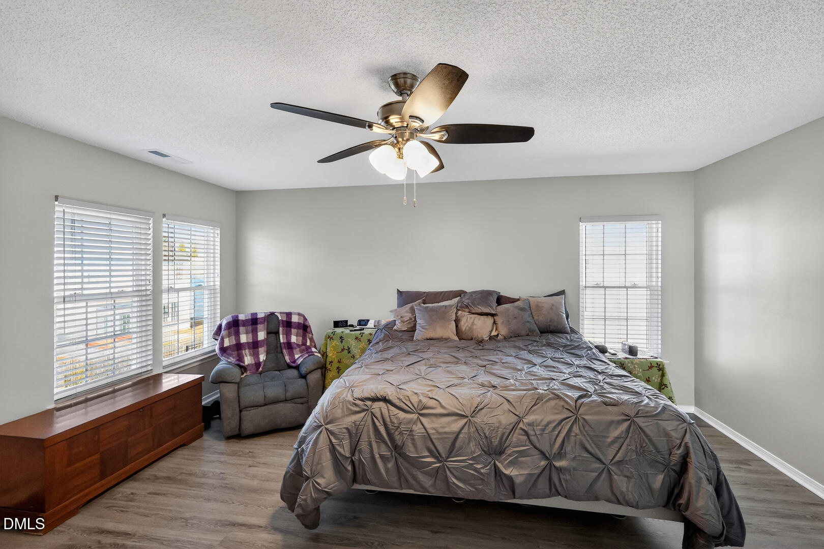 5709 Apalachicula Drive Raleigh, NC 27616 - Photo 13 of 47 a bedroom with a bed and a window
