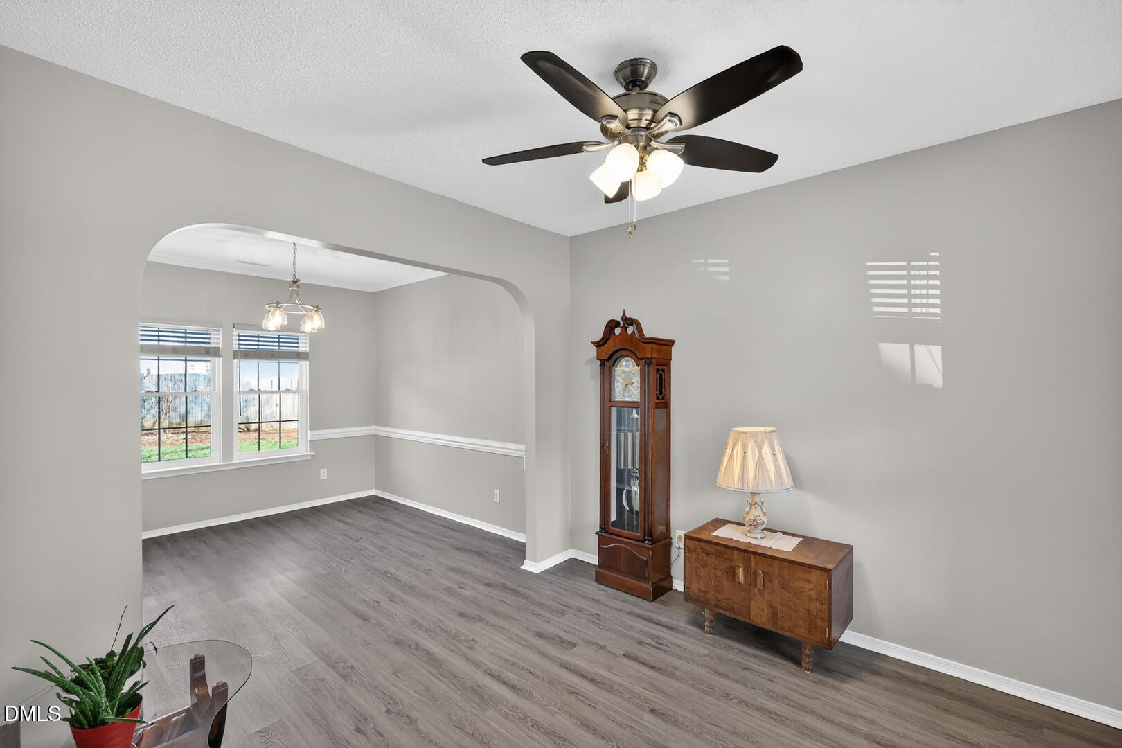 5709 Apalachicula Drive Raleigh, NC 27616 - Photo 22 of 47 a view of empty room with wooden floor and fan