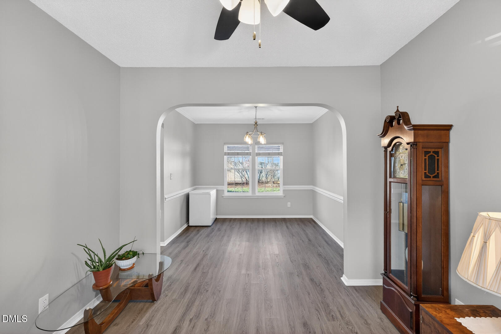 5709 Apalachicula Drive Raleigh, NC 27616 - Photo 24 of 47 wooden floor in an empty room with a window