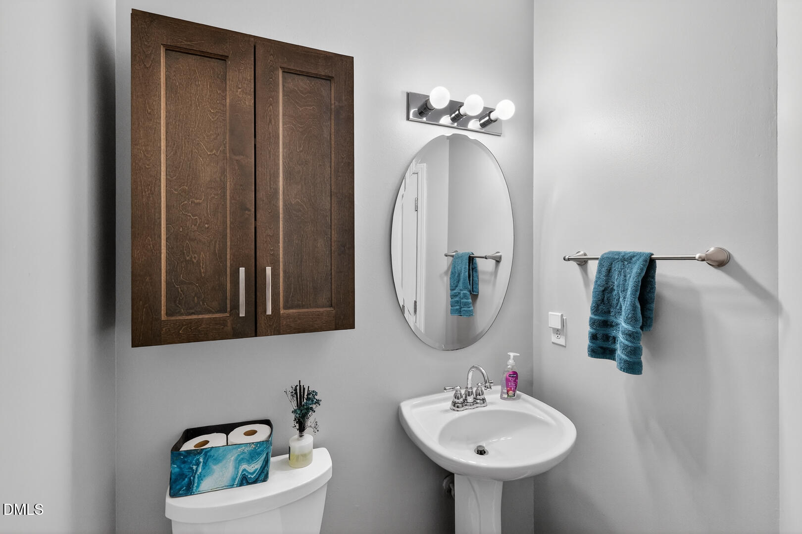 5709 Apalachicula Drive Raleigh, NC 27616 - Photo 26 of 47 a bathroom with a sink and a mirror