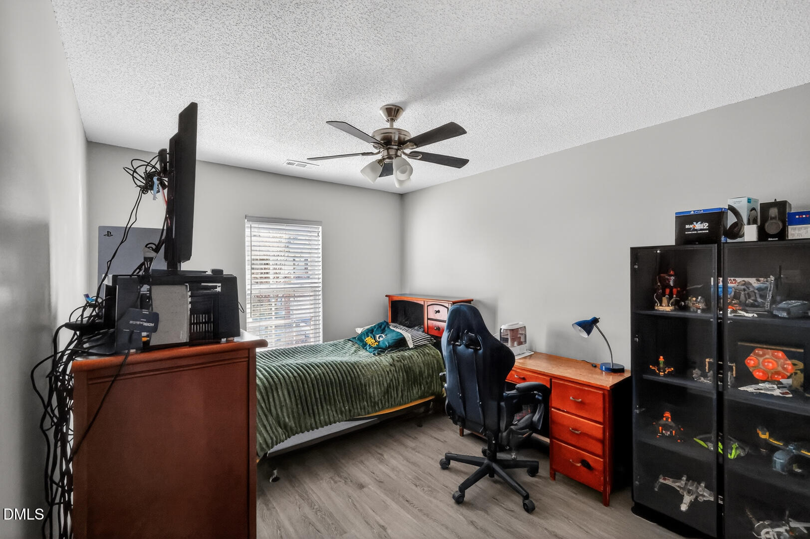 5709 Apalachicula Drive Raleigh, NC 27616 - Photo 31 of 47 a bedroom with furniture and a window