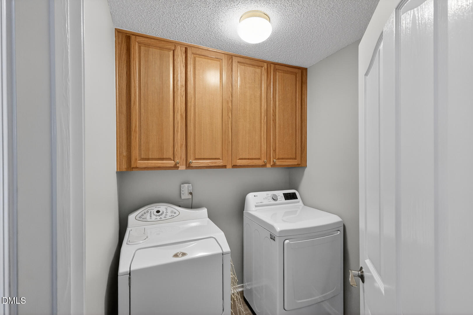 5709 Apalachicula Drive Raleigh, NC 27616 - Photo 32 of 47 a utility room with dryer and washer