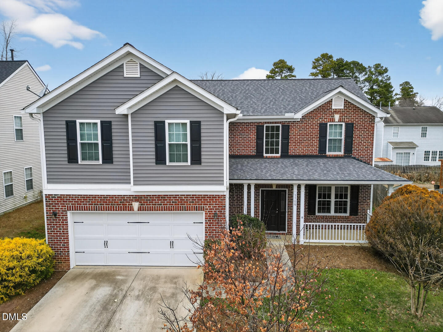 5709 Apalachicula Drive Raleigh, NC 27616 - Photo 35 of 47 a front view of a house with a garden