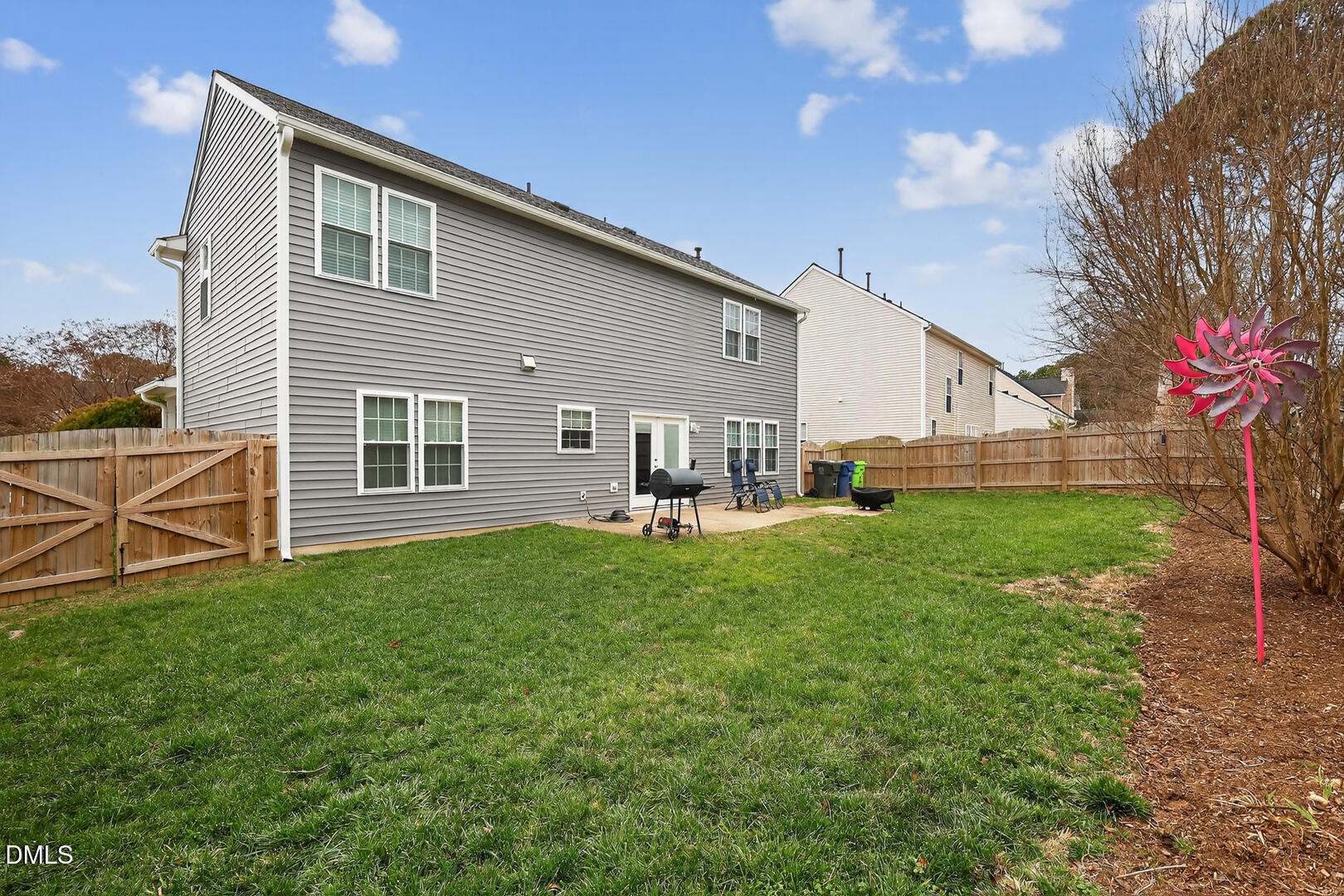 5709 Apalachicula Drive Raleigh, NC 27616 - Photo 4 of 47 a house view with a sitting space and garden