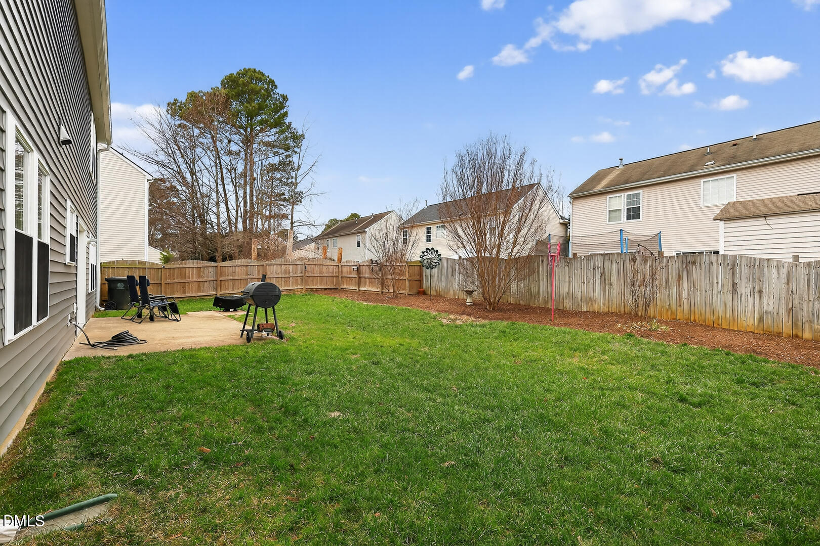 5709 Apalachicula Drive Raleigh, NC 27616 - Photo 42 of 47 a view of backyard with a garden and entertaining space