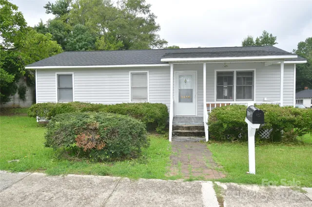 front view of house with a yard