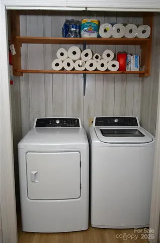 a utility room with dryer and washer