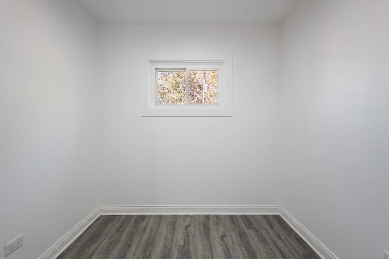 6830 South Honore Street Chicago, IL 60636 - Photo 25 of 31 a view of small space with wooden floor and window