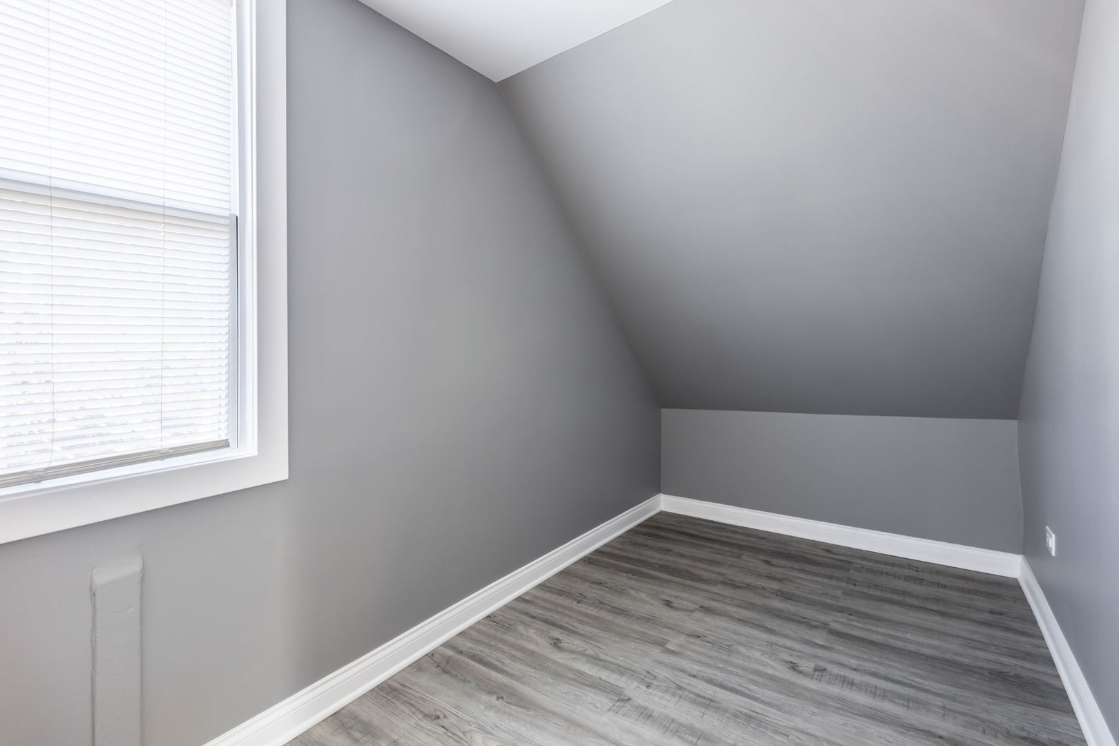 6830 South Honore Street Chicago, IL 60636 - Photo 10 of 31 a view of a small space with wooden floor and a window