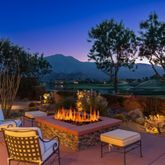 a view of a chairs and table on the terrace