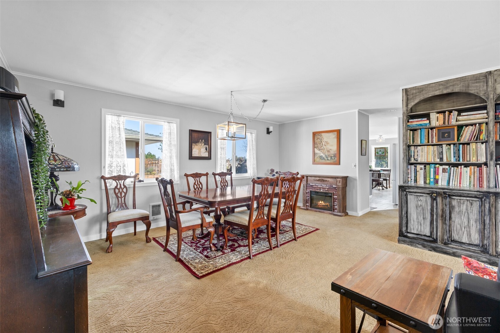 1330 Thornton Drive Sequim, WA 98382 - Photo 12 of 39 a living room with furniture a window and a flat screen tv