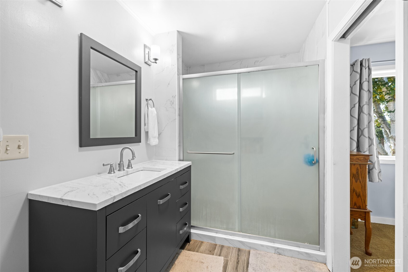 1330 Thornton Drive Sequim, WA 98382 - Photo 16 of 39 a bathroom with a sink and a mirror