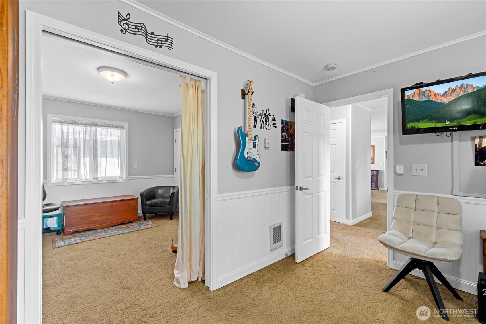 1330 Thornton Drive Sequim, WA 98382 - Photo 18 of 39 a view of a livingroom with furniture and a flat screen tv