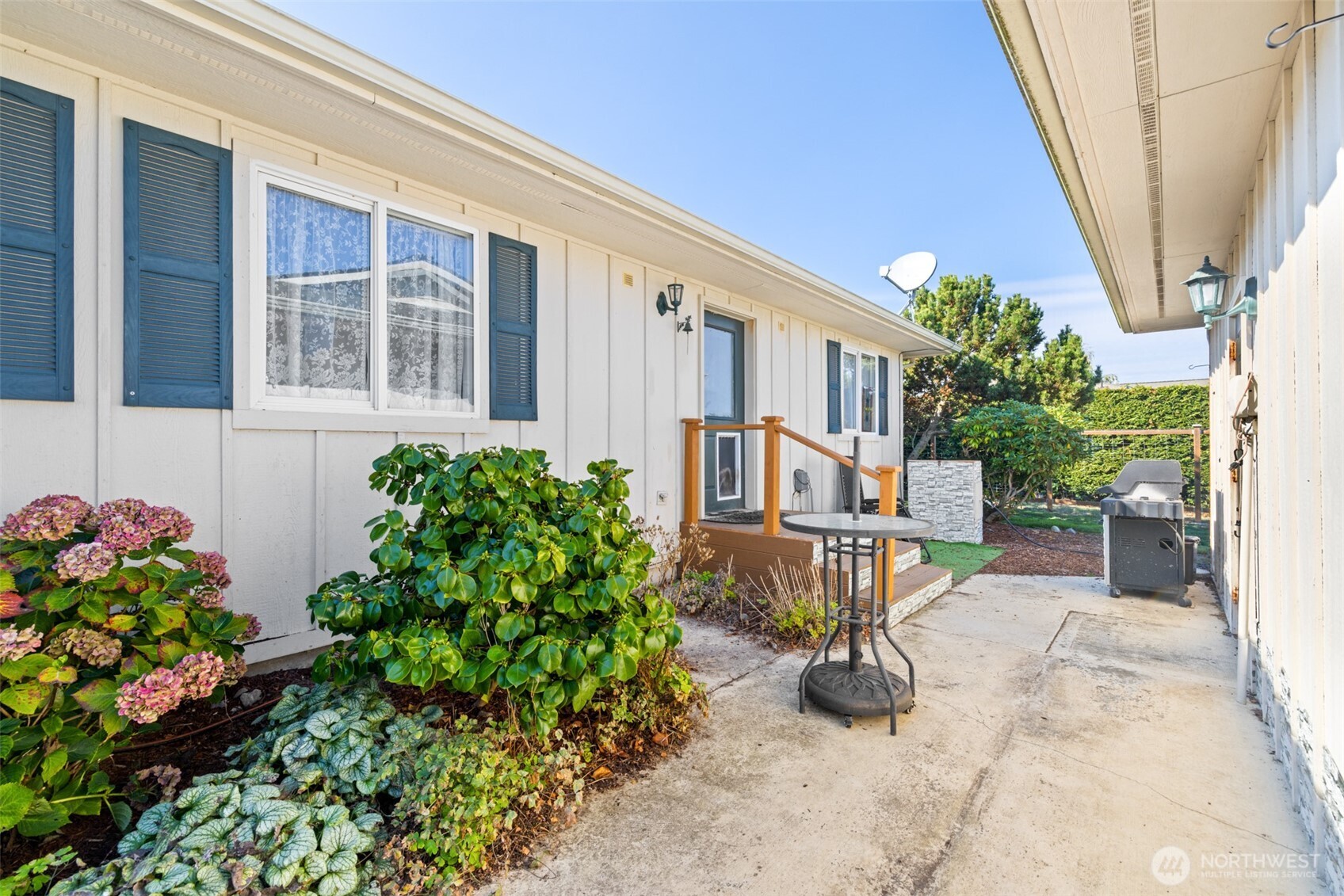 1330 Thornton Drive Sequim, WA 98382 - Photo 22 of 39 a view of a house with backyard and sitting area