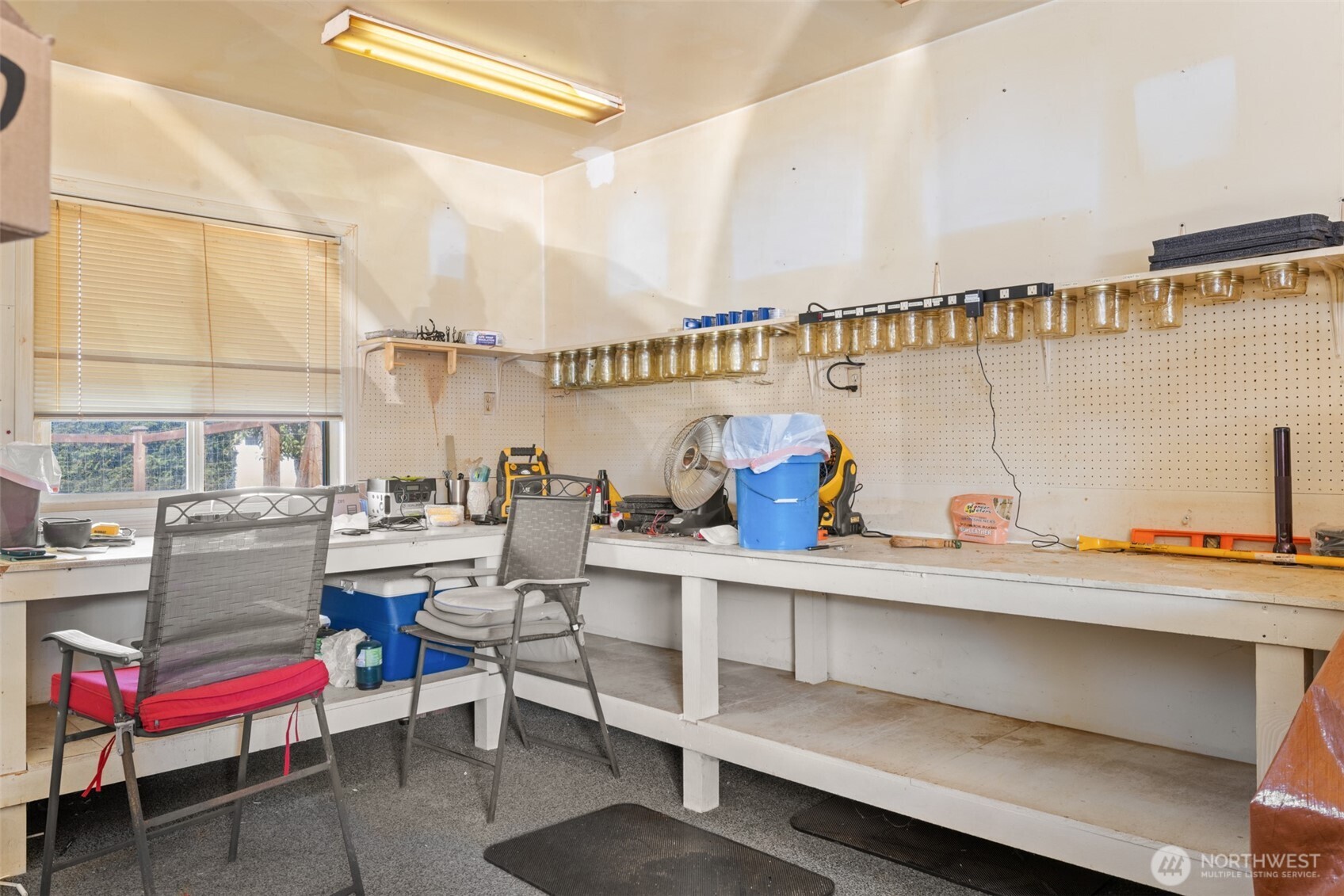 1330 Thornton Drive Sequim, WA 98382 - Photo 24 of 39 a living room with furniture a flat screen tv and a table