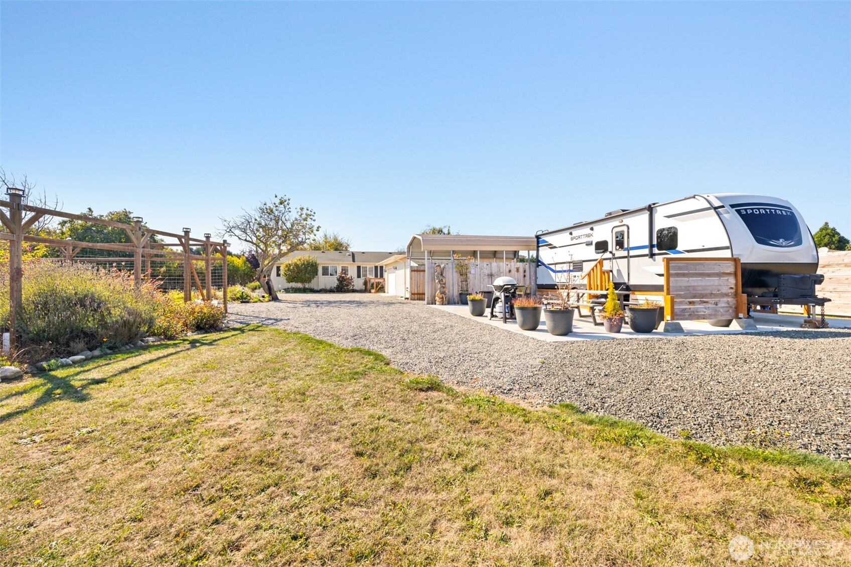 1330 Thornton Drive Sequim, WA 98382 - Photo 27 of 39 a view of a house with a swimming pool