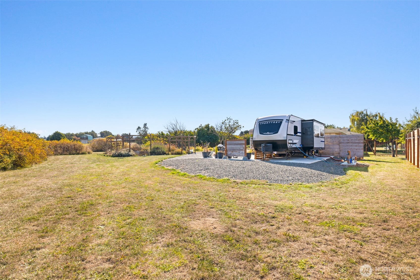 1330 Thornton Drive Sequim, WA 98382 - Photo 28 of 39 a view of a swimming pool with an ocean view
