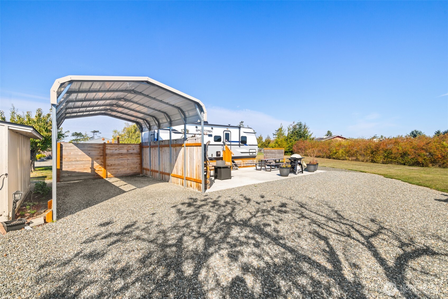 1330 Thornton Drive Sequim, WA 98382 - Photo 30 of 39 a view of a swimming pool with a lounge chair