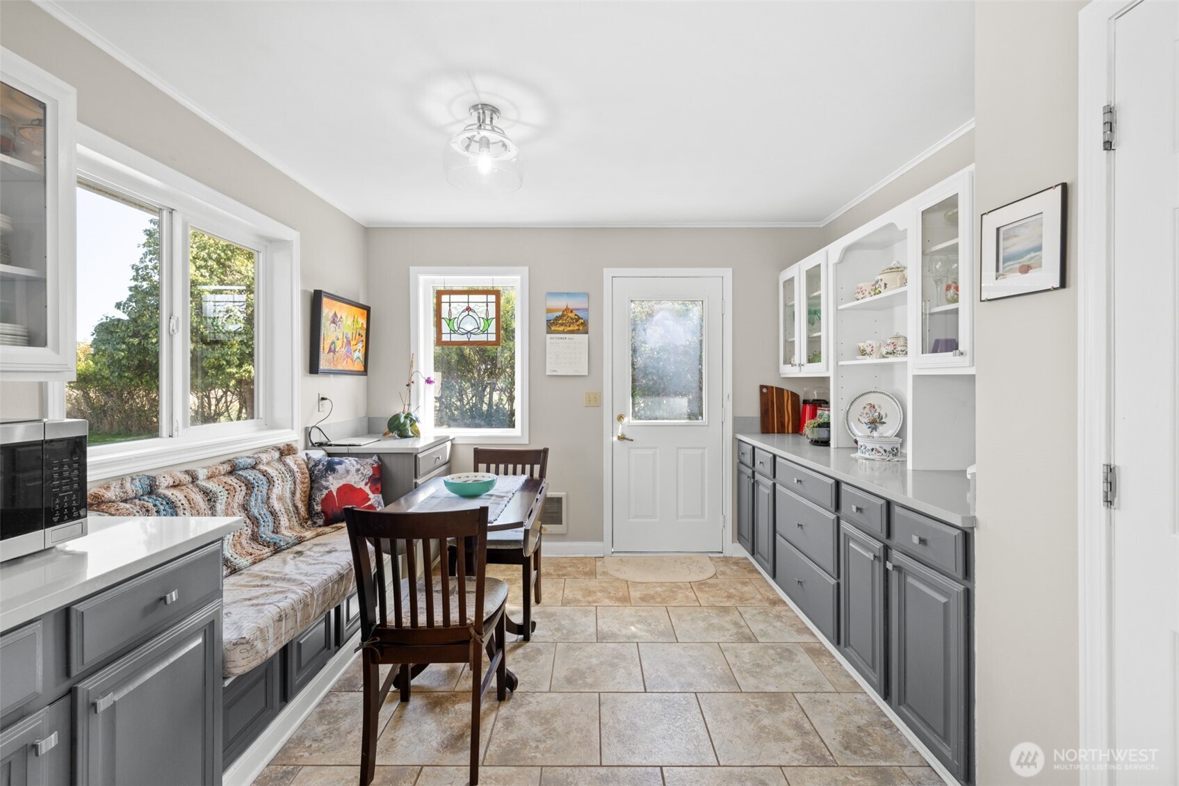 1330 Thornton Drive Sequim, WA 98382 - Photo 7 of 39 a kitchen with a sink stove top oven and cabinets