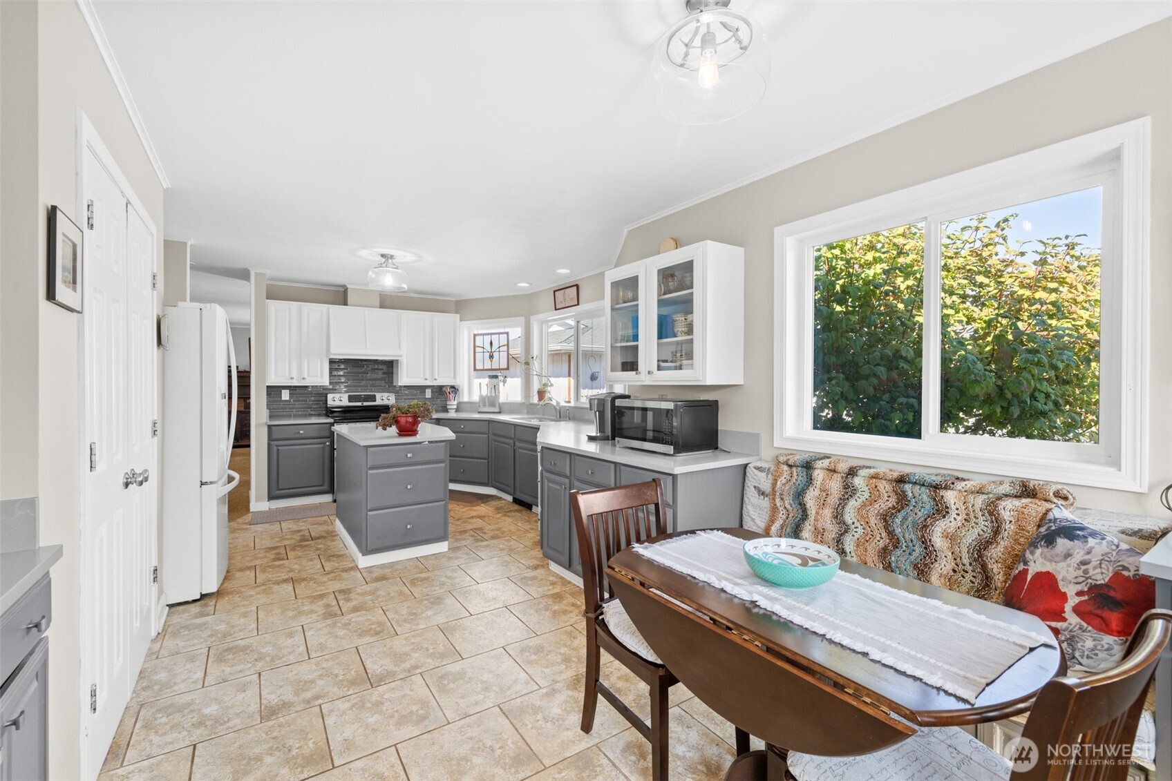 1330 Thornton Drive Sequim, WA 98382 - Photo 8 of 39 a living room with furniture and a large window