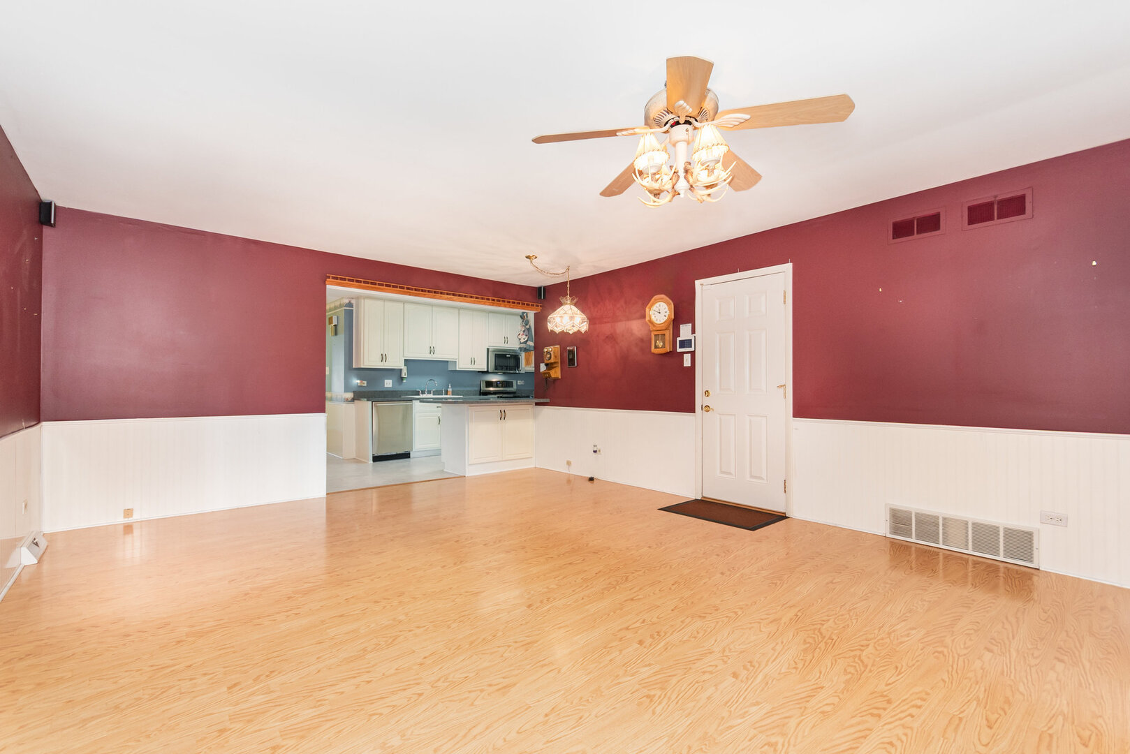 15200 Pine Drive Oak Forest, IL 60452 - Photo 11 of 20 a view of a kitchen with a sink and a refrigerator